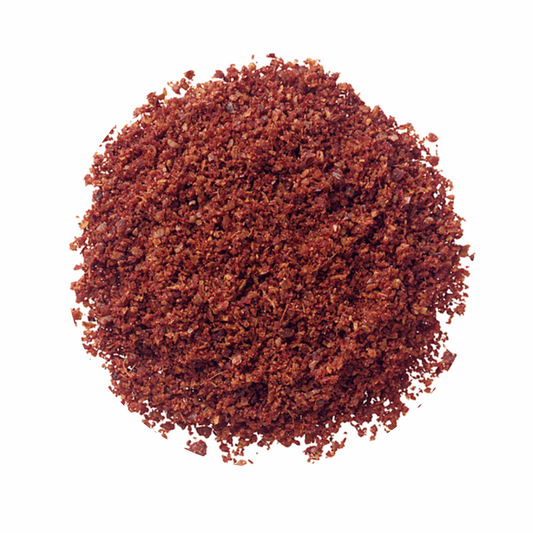 Display of ground sumac spice available for purchase.